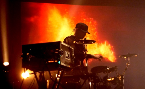 Contrast drummer performing live